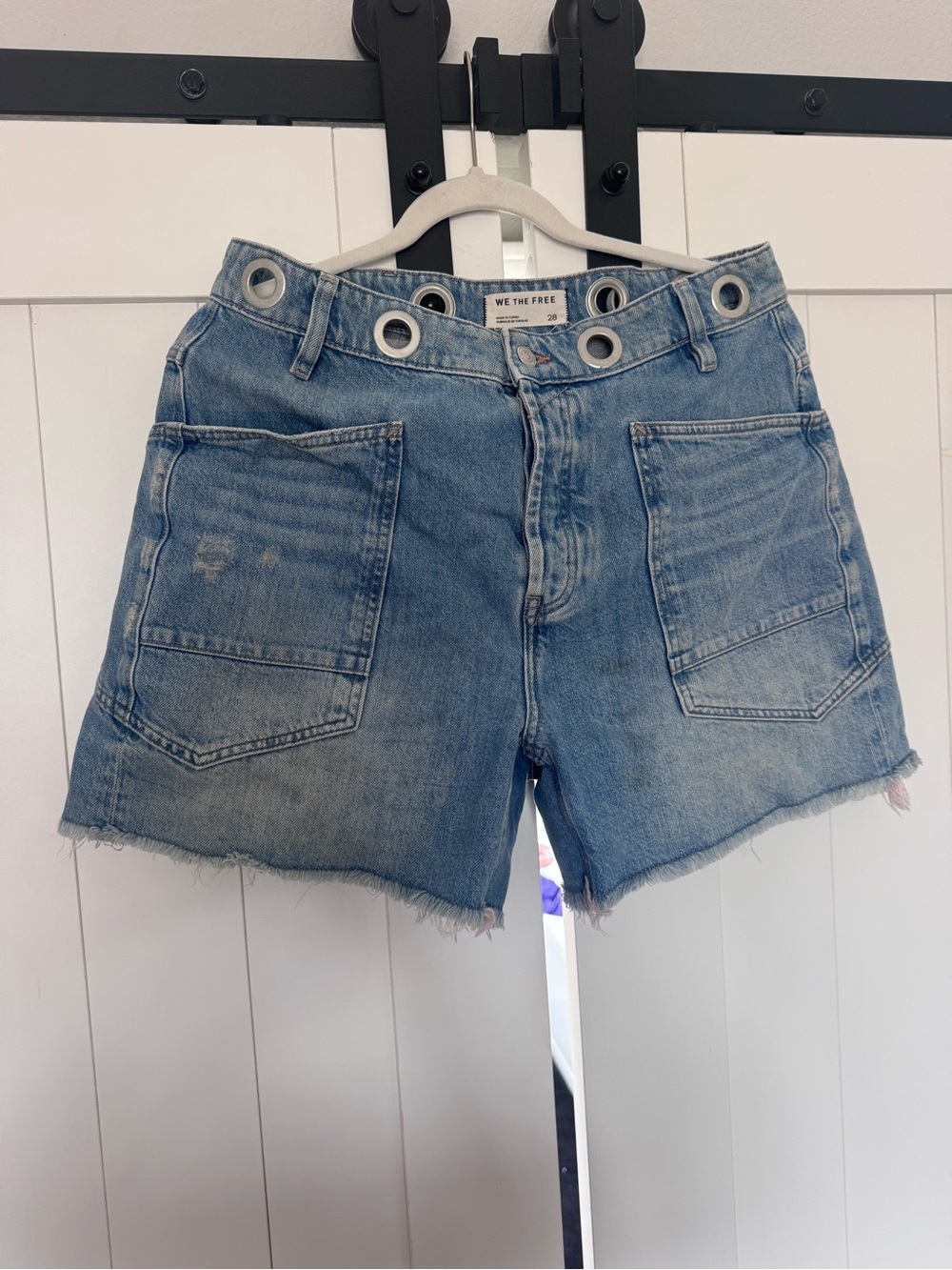 We The Free Distressed Light Blue Denim Shorts with Grommet Waist